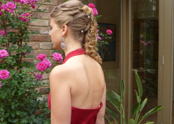 Intricate hair of bride in red