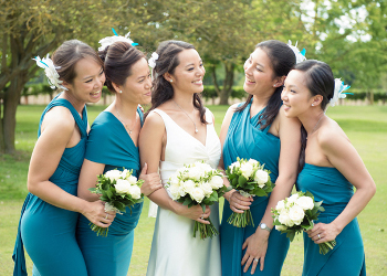 Beautiful bride and her bridesmaids